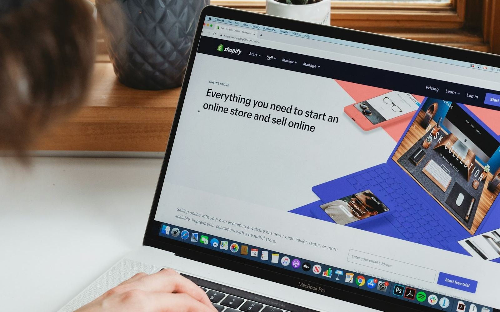 Person browsing an online store on a laptop